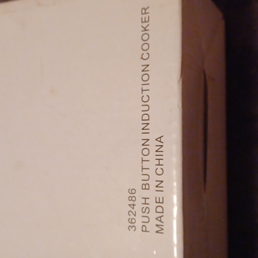 Push button induction cooker - Picture 10 of 11